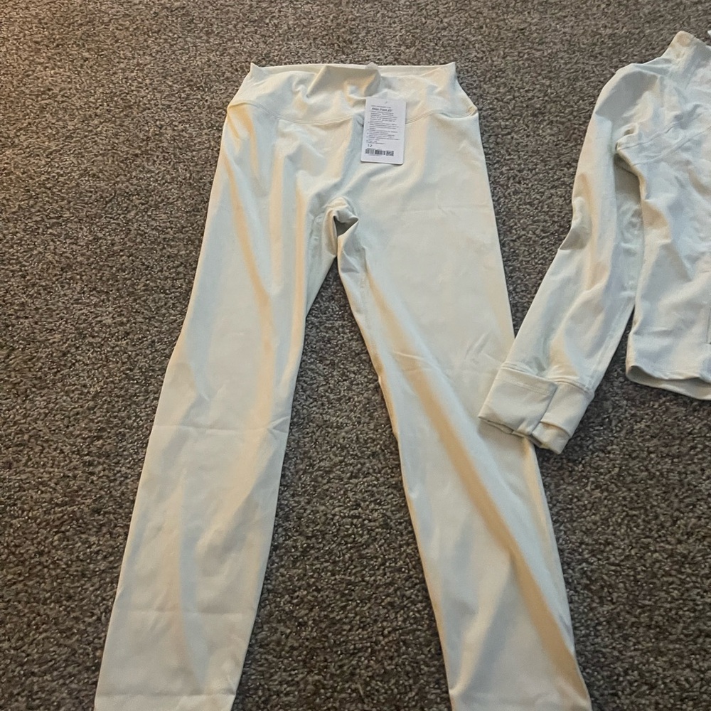 Women’s  off white track pants  size l/xl